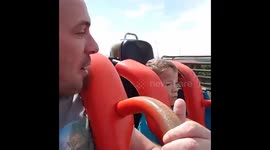 Father takes son on his first ever roller coaster ride