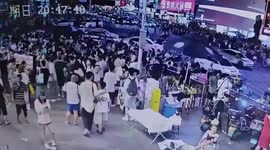 Driver ploughs into pedestrians on packed street in China