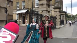 Horrible Histories Terrible Tudors stars Neal Foster and Emma Swan in character exit the Royal Mews.