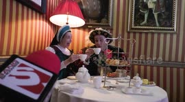 Horrible Histories Terrible Tudors stars Neal Foster and Emma Swan in character discuss coffee and gin.