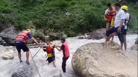 Firefighters rescue cow trapped in fast-flowing river in northern India