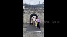 China: Tourists Visit The Nine Dragon Wall in Datong