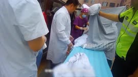 Baby born en route as traffic police escort couple to hospital in China