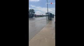 Homeless man saved by helicopter after getting stuck in flood