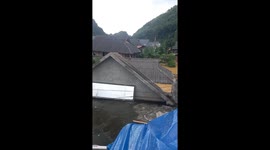 Catastrophic floods in Son La, Vietnam force residents to rooftops