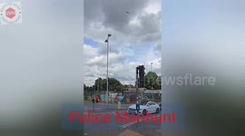Police cordon A41 after shooting and man's body found