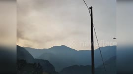 Italy: Canadair Jets into Action Over Fiorino Wildfire