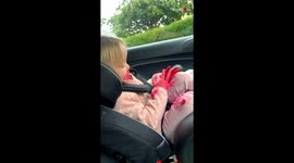 Unexpected mess: Mom catches the toddler's lipstick exploration on the drive