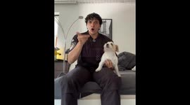 Singing duo of dog and owner