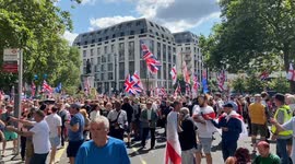 Thousands of right-wing protesters march against immigration in Central London