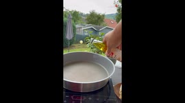 Woman celebrates sunny day by performing her Ramen magic in the garden
