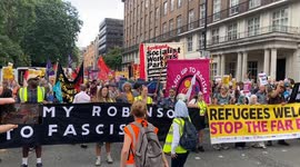 Anti-racism protesters march in counter-protest to anti-immigration march