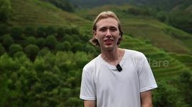 German youth explore terraced fields in S China