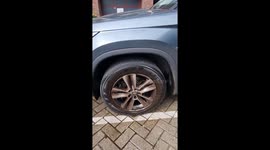Satisfying pressure washing reveals a gleaming tire hidden under dirt