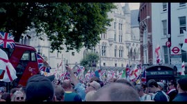 Tommy Robinson Supporters Gather Outside the Court of Justice in Central London
