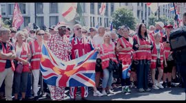 Tommy Robinson Supporters Gather Outside the Court of Justice in Central London