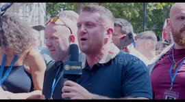 Tommy Robinson arrives at the March for Freedom Rally Outside the Court of Justice in Central London