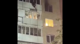 Firefighters rescue woman from burning apartment in Astana, Kazakhstan