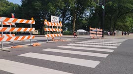 Road closures and construction preparations for the 2024 Lollapalooza Music Festival at Grant Park in Chicago