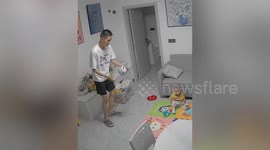 Chinese father playfully frames child after his prank goes awry