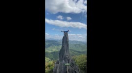 Thrilling photoshoot on steep hilltop in Rodriguez, Philippines