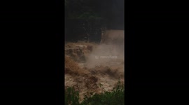 Raging torrents flow through mountain waterfall in the Philippines