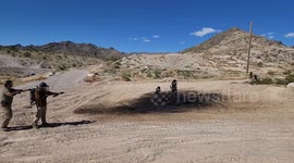 Flame Thrower in slow motion. World War 2, M2 flame thrower in action burning a target.