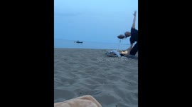 Guy On Boat Tries to Participate In Beach Yoga