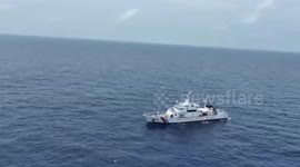 China Coast Guard ships sail near Philippine Coast Guard ship on 'peaceful' resupply mission