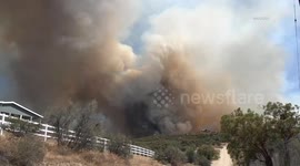 USA: Riverside County 300 Acre Brush Fire With Structures Threatened
