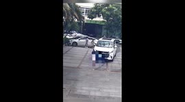 Police, passersby lift car to rescue child in S China
