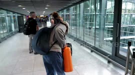 UK: Environmental Activists Disrupt Heathrow Airport with Orange Paint