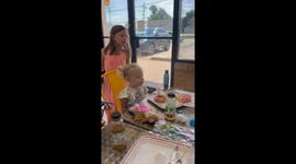 Fearless 2 y/o girl thinks that cake candles are edible