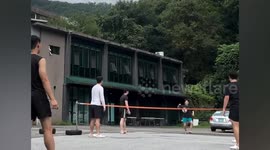 Hilarious moment man hit by slipper while playing football