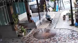 Schoolboy hops off steps to dodge ceiling as it collapses