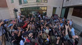 Chaotic scenes as Huw Edwards exits Westminster Magistrates Court in London