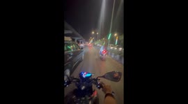 Motorcyclist falls in Mumbai, Maharashtra, India