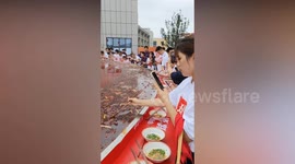Thousands gather for a giant feast on world's largest hot pot