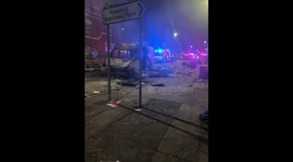 Aftermath of far-right riot in Southport: burnt vehicle and trash-littered streets