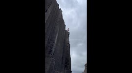 Man jumps off cliff into water in Egilsstaðir, Iceland