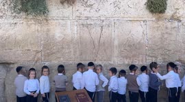 Israel: Male Haredi kids pray and sing at the Western Wall in Jerusalem, Israel