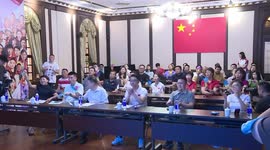 Coaches and teammates of Chinese diver celebrate gold medal win