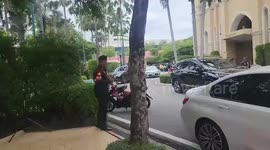 Snakes in the government! Reptile slithers through parliament building in Bangkok