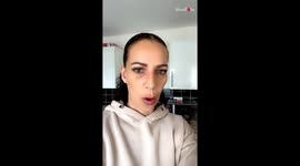 Little girl's funny makeup session with mom's eye shadow palette and brush