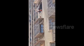 Boy survives fall from sixth floor, lands safely on security bars in China