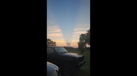 Clouds cast shadows over sunset in Albertson, New York
