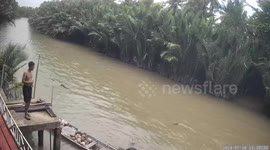 Dock collapse in Thailand sends local into water