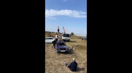 Man in Krasnodar, Russia performs stunt with axe dropping between his legs