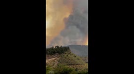 Aircraft drops fire retardant on Alexander Mountain Fire in Colorado