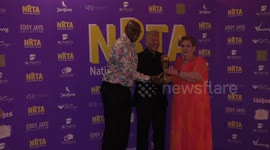 Anne Hegerty and Shaun Wallace proudly show off award at National Reality TV Awards